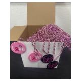 About 100 breast cancer awareness necklaces