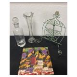 11ï¿½ stand with glass vase, bottle and hot