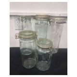 5 glass jars.  9, 7 and 13 in