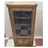 Glass door cabinet on wheels