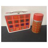 Vintage metal lunch box with thermos