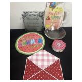Group of summer time decor and friendship candle