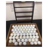 Golf balls with wood display