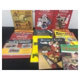 Group of Coca Cola collector books  and trains
