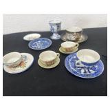 Group of min teacups and saucers
