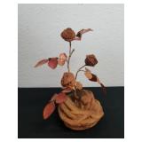 Stone and copper arrangement