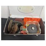 Group of sanding disc and tools in metal box