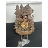 hand-carved Black Forest-style cuckoo clock.16ï¿½