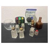 Group of perfume bottles, candle, old glass