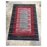 49x38.5in Area Red and Black Rug