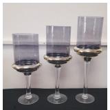 3 matching candle holders