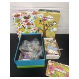 3 storage boxes one is full of jewelry