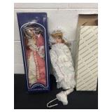 2 collector porcelain dolls.