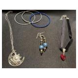 Group of necklaces and bracelets and earrings