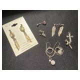 Group of earrings and necklace pendants