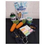 Group of dog items. Including leashes, poop bags,