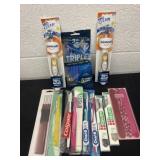 Group Of tooth brushes and razors