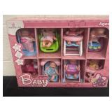 New in box Set of 8 mini baby dolls
