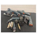 Group of black and Decker tools with batteries