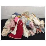 Group of vintage doll clothes