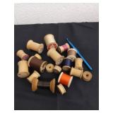 Group of vintage wooden spools of thread, bobbins