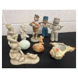 Group of ceramic figurines. 2 eggs and shell