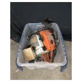 Tote of Chainsaw Parts