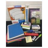 Group of office items: markers, stencils, paper