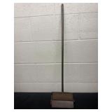 Vintage floor brush, wheels on one side are