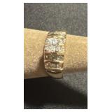 Marked 18k ge yellow gold round diamond band