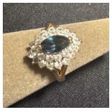 Marked 14k ge marquise-cut blue gemstone and a