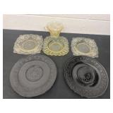 Group of yellow depression glass and 2 black