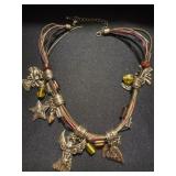 multi-string charm necklace with assorted amber