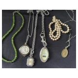 Group of necklaces and bracelet and watch