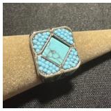 Size 10.5 men turquoise colored ring