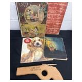 Group of vintage books with wood 6 shooter