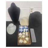 Group of jewelry, necklace displays and ring