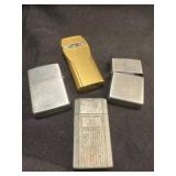 4 lighters and 2  are zippos