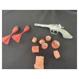 Hubley cap gun and 2 darts