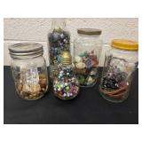 5 glass jar of beads