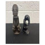 replica of a Taino Zemi figure and the right