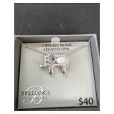 Sterling silver opal elephant necklace