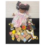 Wood blocks and baby doll