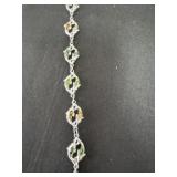 silver tone link fashion bracelet featuring