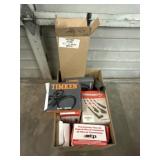 Box of Filter Kits, Spark Plug Wire Sets, and