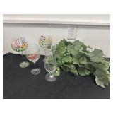 Painted wine glasses with greenery