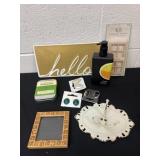 Body lotion, hello sign,earrings and