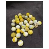 5ï¿½ jar of white and yellow marbles