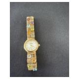 vintage gold-tone ladies' watch with a gemstone