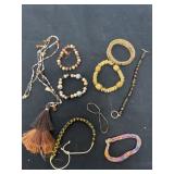 8 bracelets with necklace.